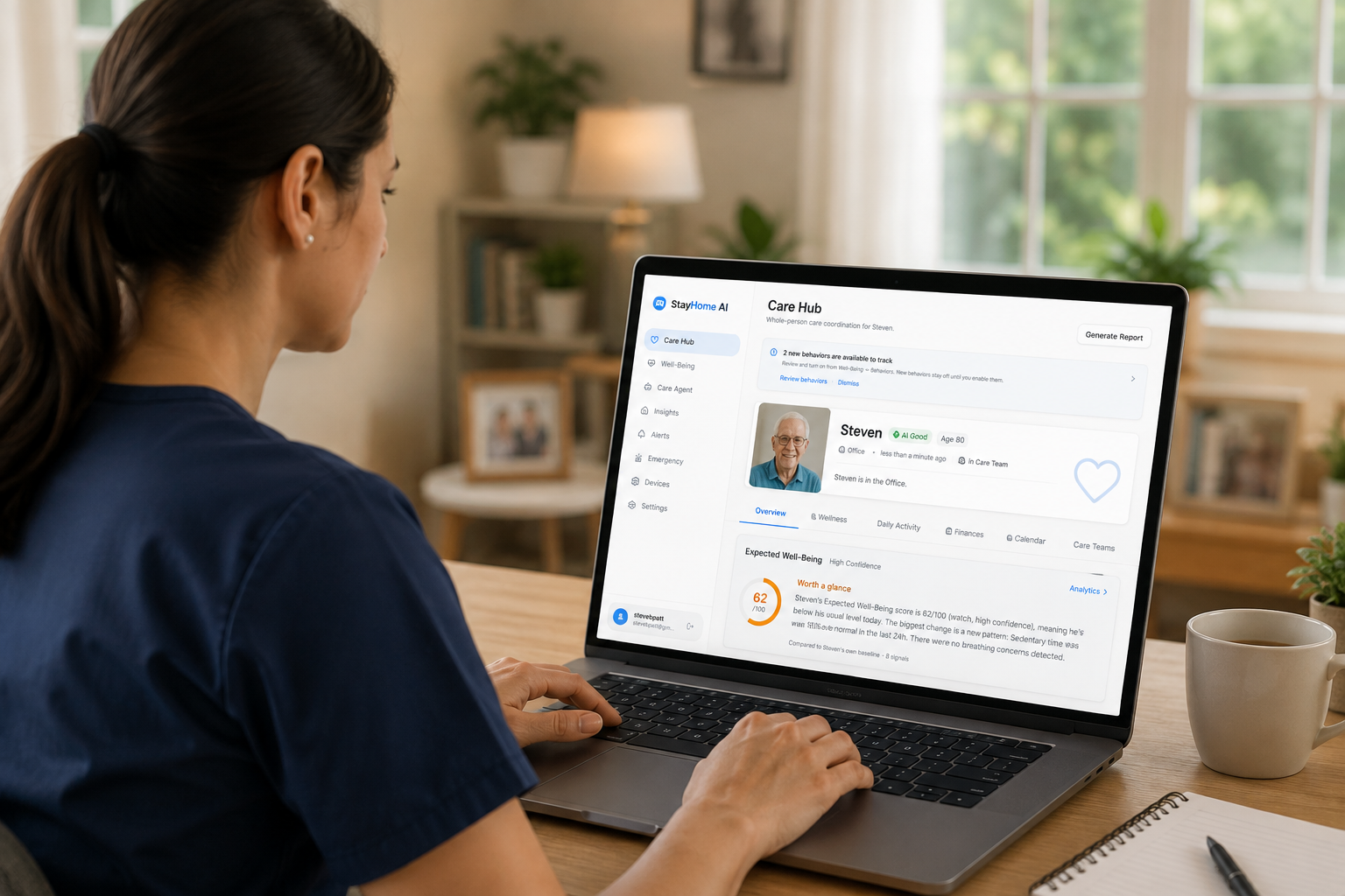 A care professional reviewing a patient's StayHome AI Care Hub on a laptop
